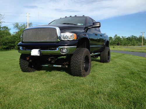 2004 ram 2500 cummins 8 inch lift 38's