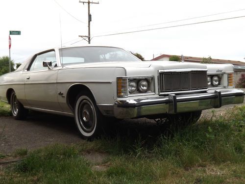 1975 merc marguis broehm. 2 door hard top. 460, auto. white with red interior.