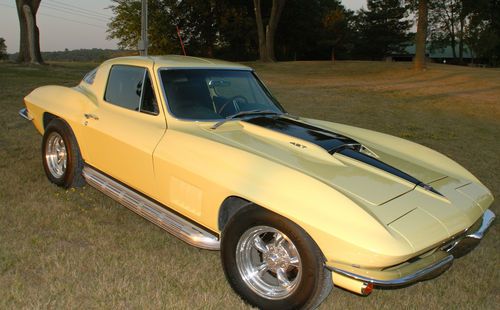 1967 corvette 427/435 sunfire yellow coupe, side pipes, leather,tank sticker