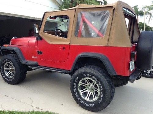 1989 jeep wrangler 117k miles - red - clean - 5 speed - lifted