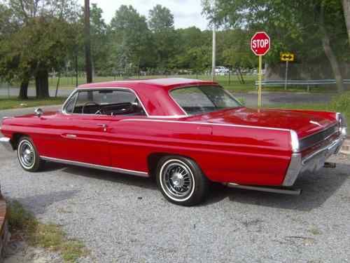 1962 red pontiac grand prix