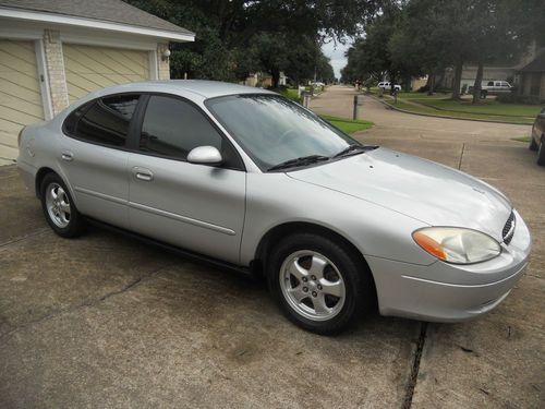 2003 ford taurus ses cold ac, 2014 stickers, new tires, no dents, needs nothing