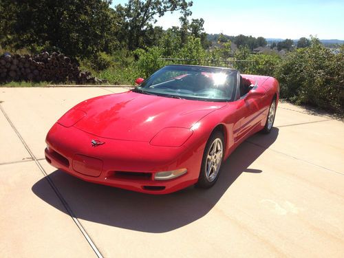 Torch red, black interior, black soft top, excellant condition, automatic