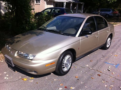 1999 saturn sl2  sedan 1.9l, automatic, 3 month warranty , no reserve, great car