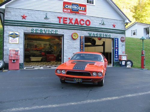 A real 1972 dodge challenger 340 rally car hemi orange bucket seats