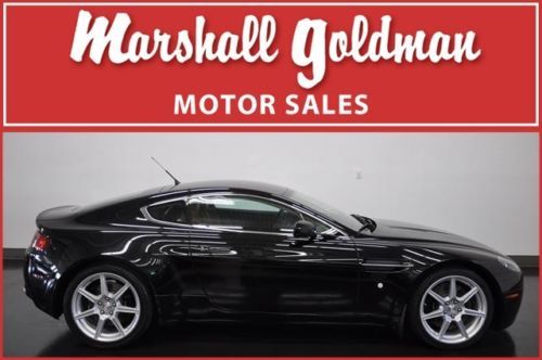 2006 aston martin vantage black/saddle  6 speed navigation only 11000 miles