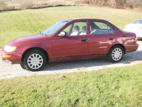 1997 toyota corolla ce sedan 4-door, very clean and in good running condition