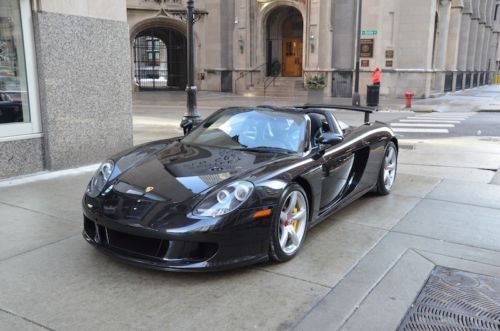 2005 porsche carrera gt #461 basalt black only 696 miles!! super clean, luggage!