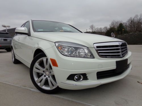 Clean carfax, local trade, 4 matic awd, low miles, white and charcoal