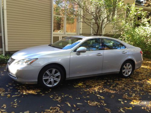 Silver, moon/sun roof, one owner, non-smoker, dealer-maintained