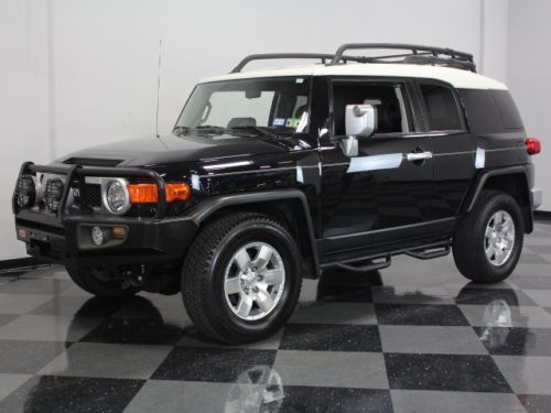 Black on black fj, only 50k original miles, very clean inside and out