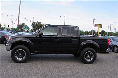 2006 nissan frontier se lifted 6 spd awd navigation best price must see!