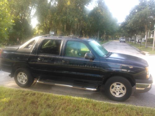 2004 avalanche  dark blue metallic $9,500