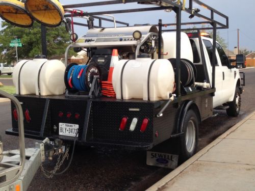 2008 f350 diesel 4x4 dually flatbed, with a  turnkey power washing setup