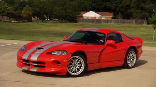 Red acr w/silver stripes!!  good miles(26k), with factory a/c!! financing!!
