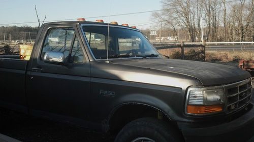 1996 ford f250 with a snow plow.