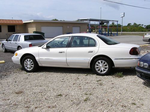 1999 lincoln continental/white/4 door/project car