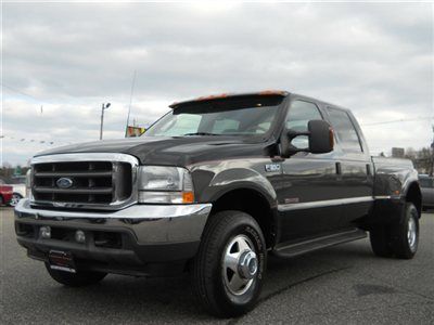 We finance! supercrew lariat le 4x4 dually only 66k powerstroke diesel awesome!