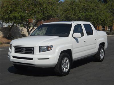 A loaded up ridgeline with  leather moonroof nav what a beauty