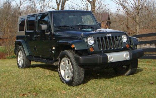 Unlimited sahara - automatic 4 door - clean inside and out - plenty of extras!