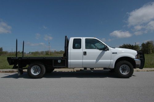 2004 ford f-250 extended cab lwb 4wd v8 automatic - brand new hay bed