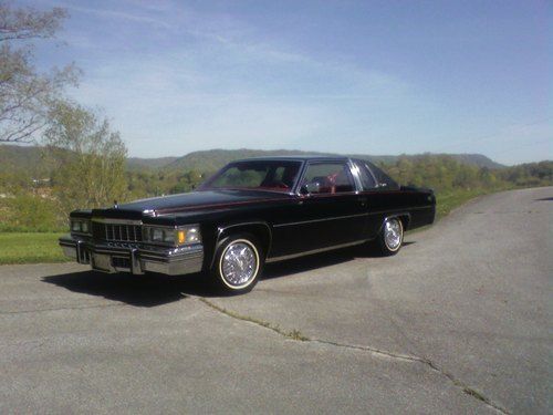 1977 cadillac coupe de ville.  black.  16,711 actual miles.  excellent condition