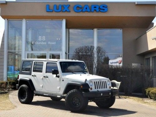 2010 jeep wrangler unlimited sport 4wd lifted 2 tops