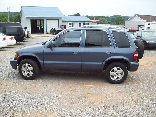 2002 kia sportage base sport utility 4-door 2.0l