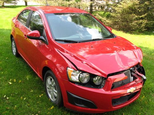 No reserve repairable wrecked 2012 chevrolet sonic lt 4-door 1.8l salvage