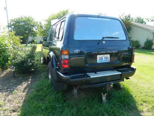 1994 toyota land cruiser, hunter green, front quarter panel damage