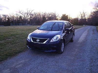 Salvage title,wrecked,damaged,nissan versa