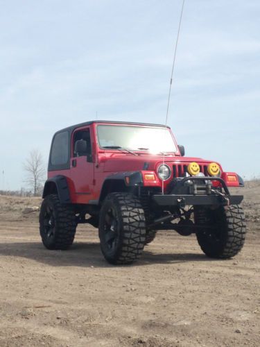 2004 jeep wrangler with 8&#034; lift and 37&#034; tires in great condition.  many new part