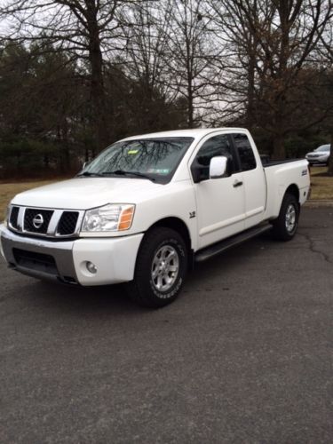 2004 nissan titan se  pickup 4-door 5.6l, always dealer serviced! clean