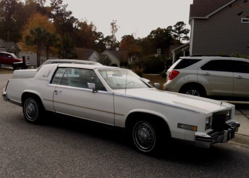 White cadillac eldorado biarritz 1984 v-8 with 33,000 miles mint