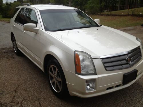 2004 cadillac srx,, 3rd row, heated leather,dvd player