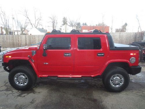 Fully loaded hummer h2 4x4 sut with 6' cargo area and 2,200 pound max payload
