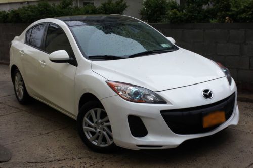 2012 mazda 3 i touring w/ 2.0l skyactiv engine w/ 25,585 miles.