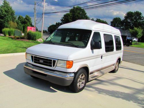 Luxury high top conversion van ! sherrod edition ! power sofa ! low mileage ! 04