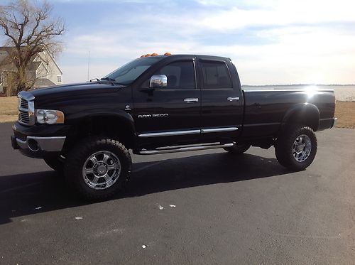 2004.5 dodge ram 3500, 5.9 cummins diesel, laramie, with only 60k miles, lifted