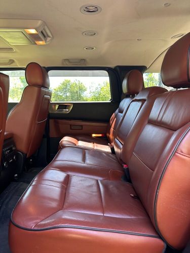 2008 h2 black. garage kept. 2nd owner. 151,000 kilometers. 3rd row seating.