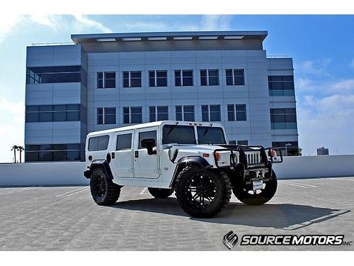 H1 white wagon, 22" wheels, elocker, fender flares, navigation, rockford fosgate