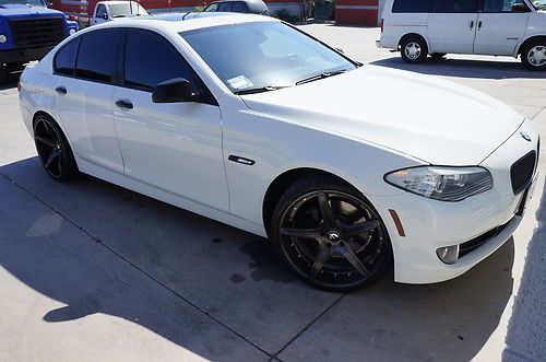 White excellent condition 4door 535i with 21" forgiato rims, and sounds