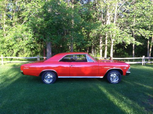 1966 chevelle malibu, 283 ci with muncie 4 speed, orange, very solid car