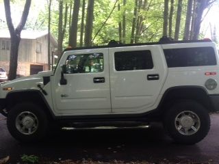 Hummer h2 2003 white - 3 sets of rims including 22"xd