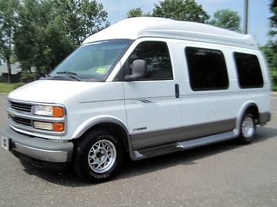 High-top conversion van - power bed - tv / dvd / cd - runs great! - no reserve!