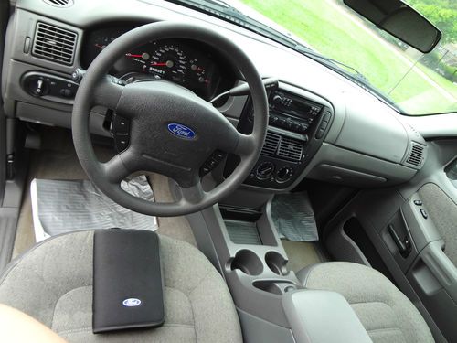 2004 ford explorer, 4 door wagon (silver) 4.0l,  4 wheel drive - one owner!