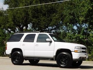 2002 tahoe z71,sirius,rear a/c,black wheels/nitto tires --&gt; texascarsdirect.com