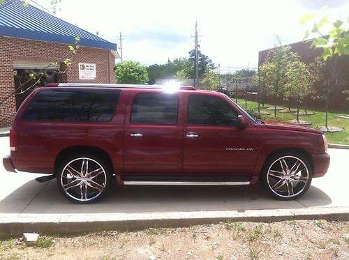 2004 cadillac escalade esv with $5,000 custom stereo, 20" flip &amp; sitting on 26,s