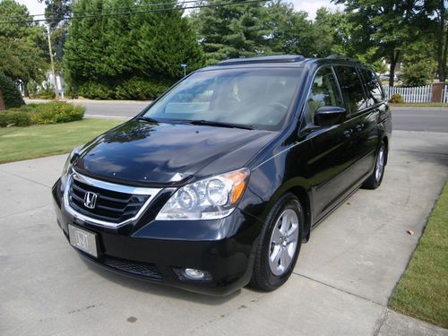 Pearl black 2009 honda odyssey touring 8 passenger van fully loaded!!