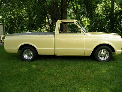 Completely redone short bed fleetside pearl yellow 350 cu in 350 trans lowered